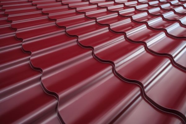 Steel roof painted in deep red colour